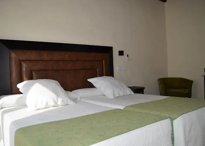 Turísticos - Alisos Apartahotel Aliseda